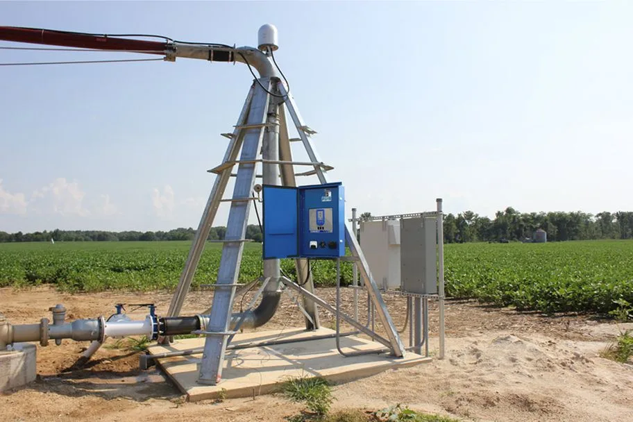 Blue Reinke control enclosure at the center of a pivot system